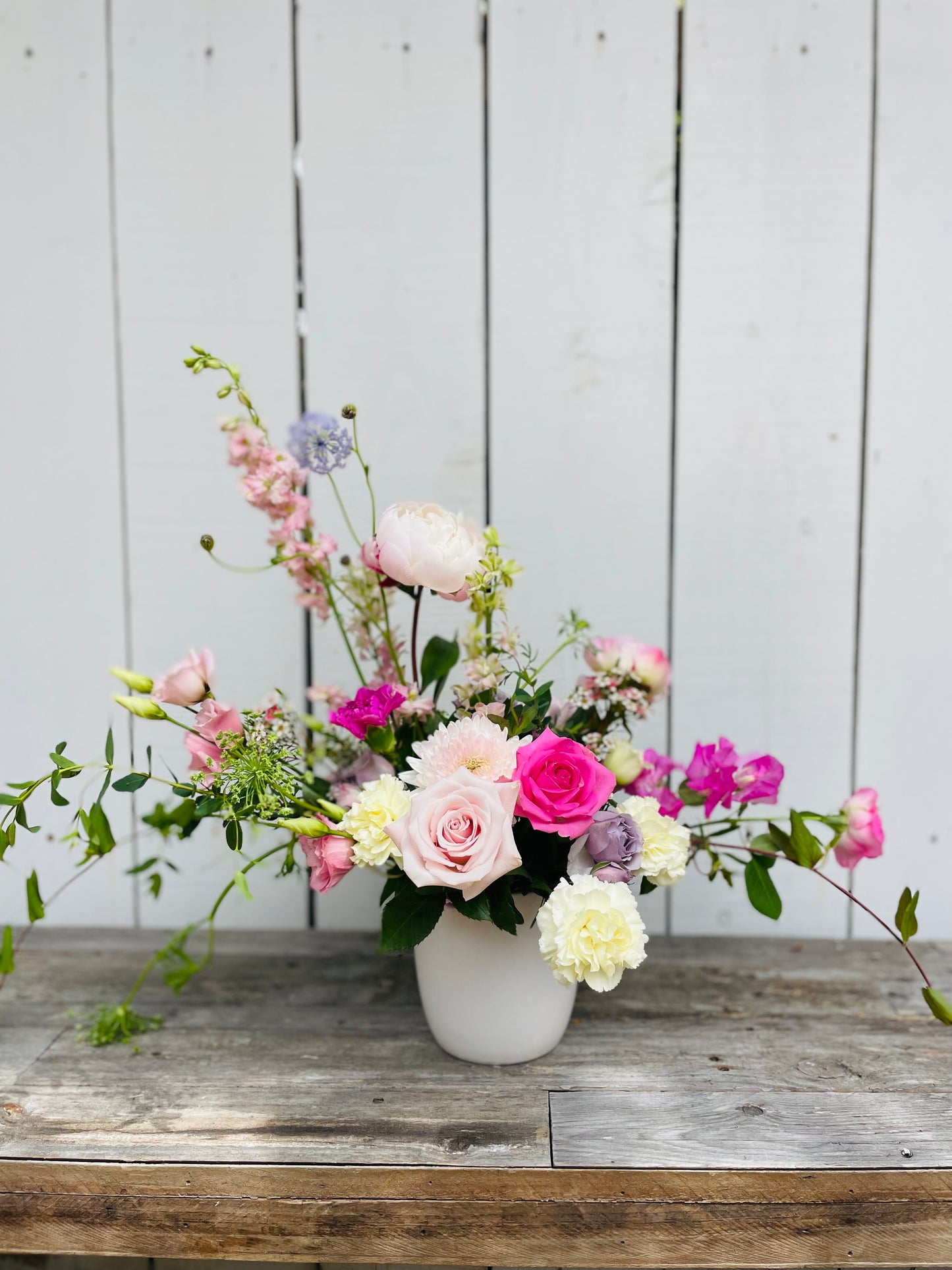 4. Lush Seasonal Arrangement- Designers Choice