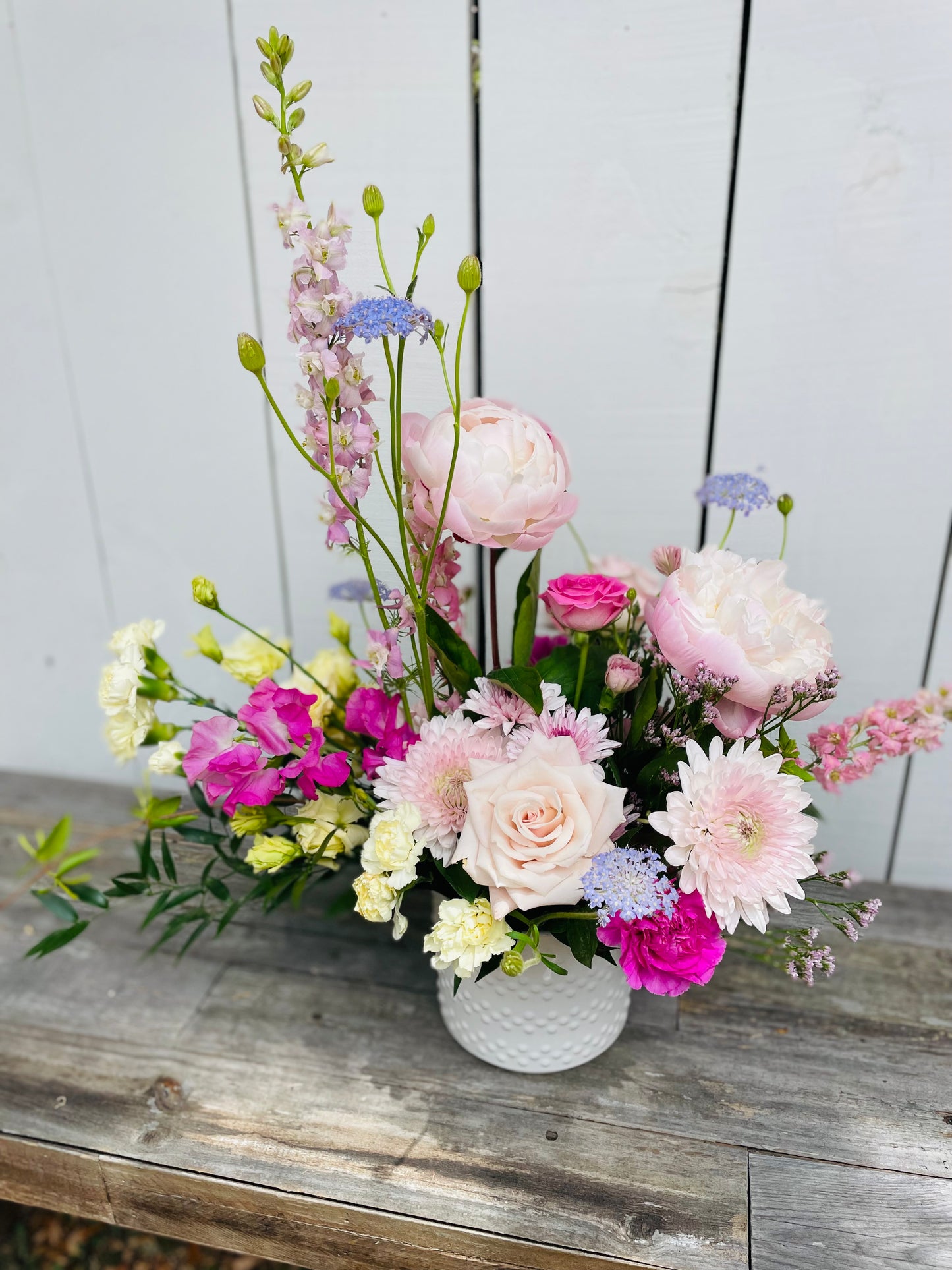 4. Lush Seasonal Arrangement- Designers Choice